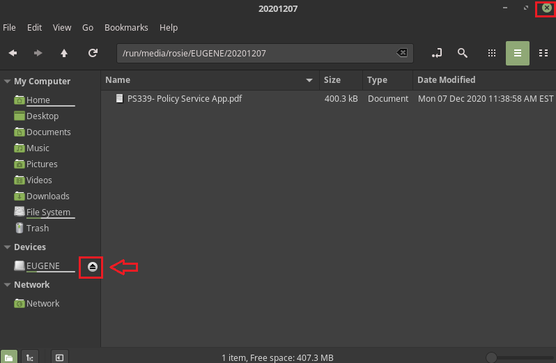 File Explorer showing folder 20201207 on  EUGENE thumb drive. PS339- Policy Service App.pdf is the only file in the files area. A red rectangle is around the button to the right of EUGENE - the Eject button.  A red arrow is pointing to it.